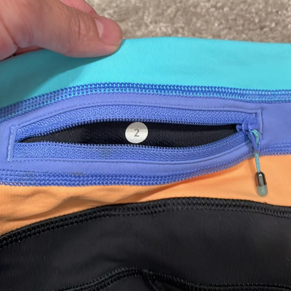 Size 2 Lululemon black pants with side pockets. - Picture 3 of 5